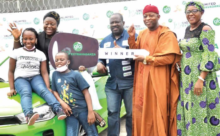 Woman wins car in Glo Joy Unlimited Extravaganza promo
